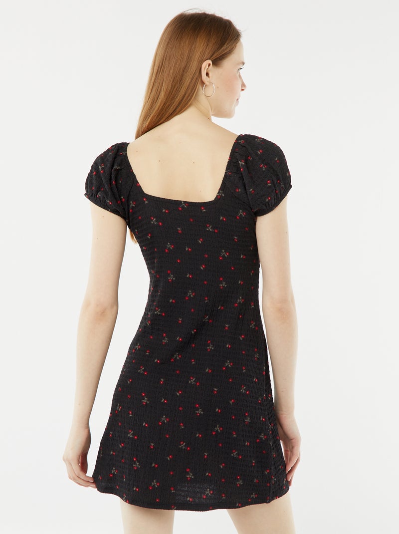 Vestito corto in tessuto goffrato a maniche corte NERO - Kiabi