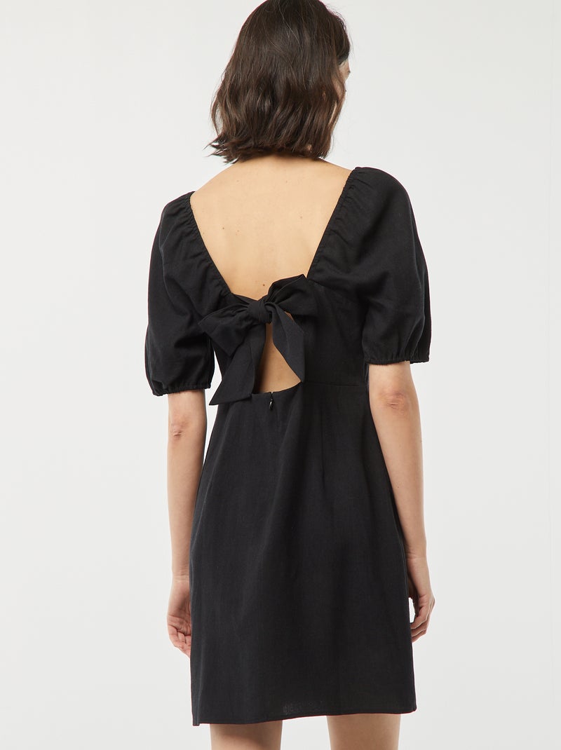 Vestito corto svasato con allacciatura con fiocco dietro nero - Kiabi
