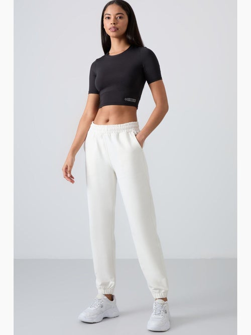 Women's joggers in felpa relaxed a vita alta tommy - Kiabi Women's joggers in felpa relaxed a vita alta tommy - Kiabi