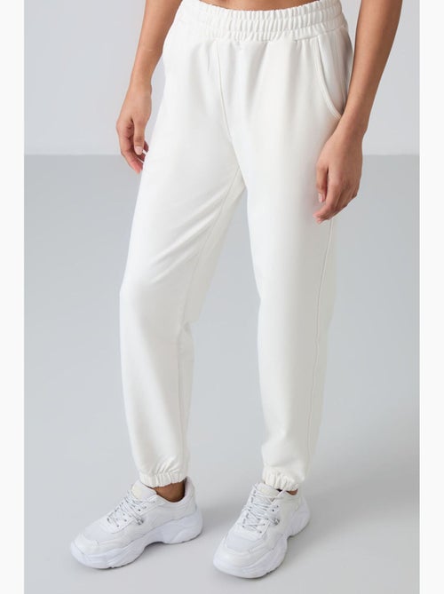 Women's joggers in felpa relaxed a vita alta tommy - Kiabi Women's joggers in felpa relaxed a vita alta tommy - Kiabi
