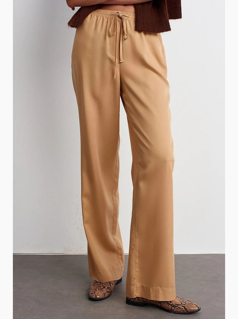 Women's pantaloni a gamba ampia in tencel dilvin Biondo - Kiabi