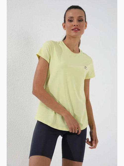 Women's t-shirt tinta unita a maniche corte con girocollo tommy - Kiabi Women's t-shirt tinta unita a maniche corte con girocollo tommy - Kiabi