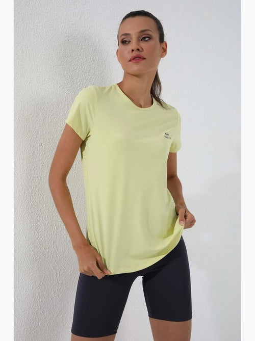 Women's t-shirt tinta unita a maniche corte con girocollo tommy - Kiabi Women's t-shirt tinta unita a maniche corte con girocollo tommy - Kiabi